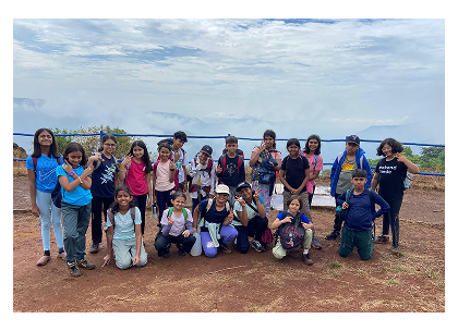 Group of children at an outdoor INME camp